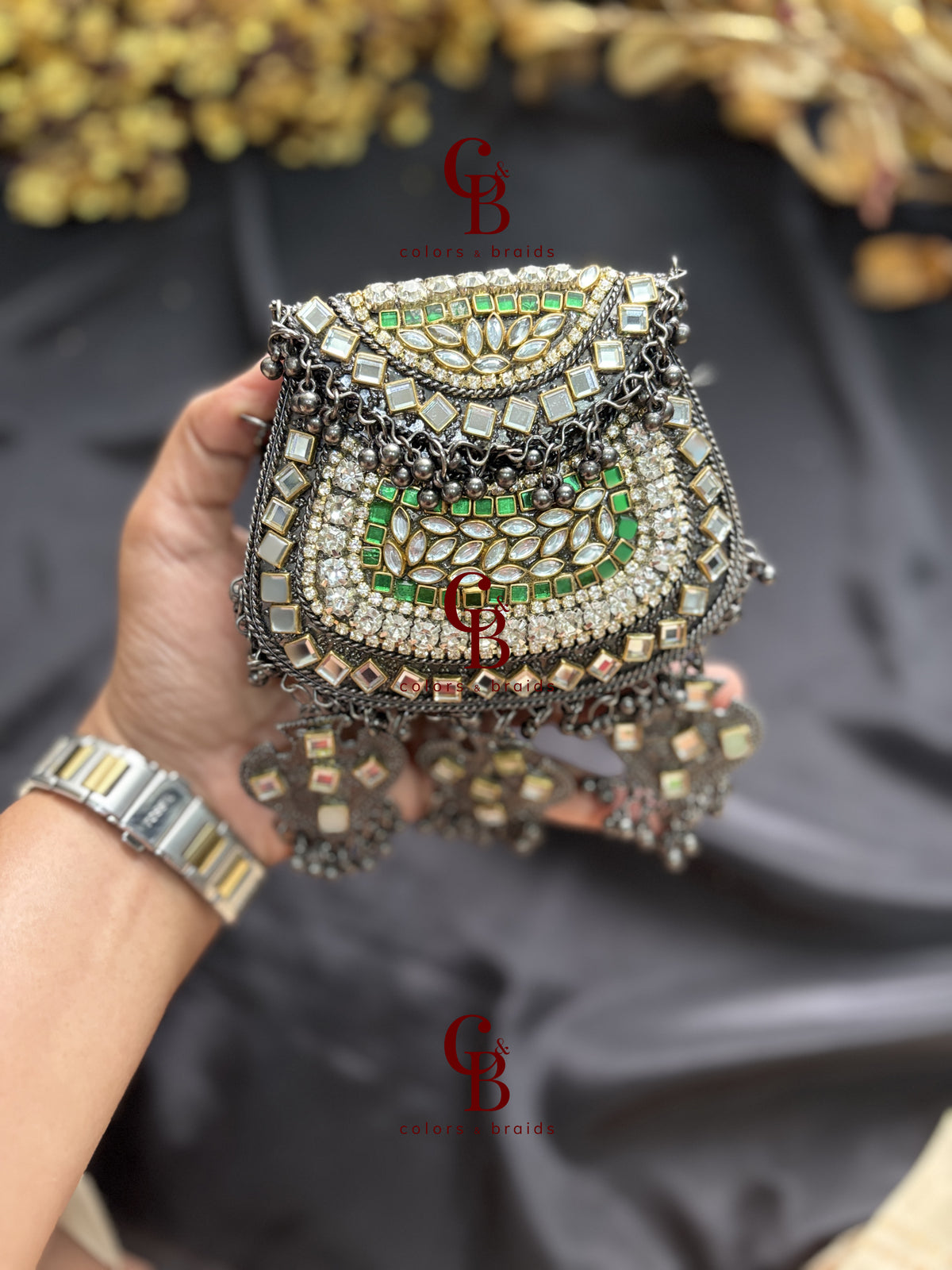 Metal Ghungroo Kundan Clutch with Grey Base