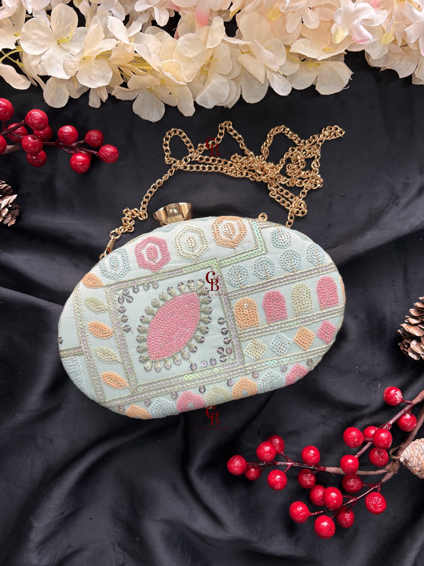 Sophie Clutch Now in bigger oval shape