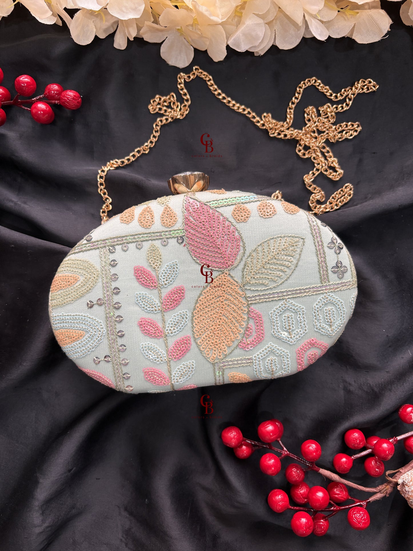 Sophie Clutch Now in bigger oval shape
