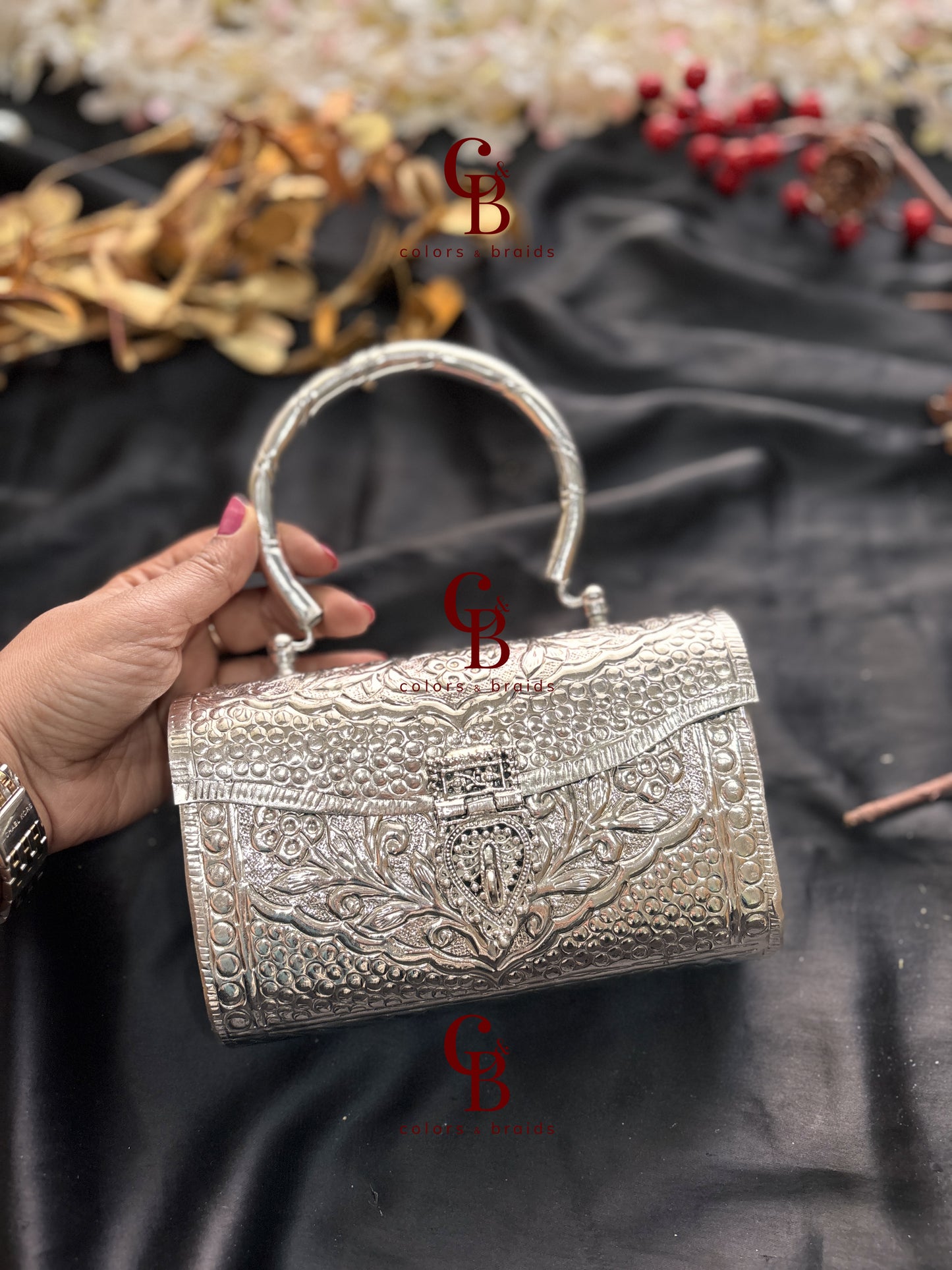 Diya Silver Brass Clutch