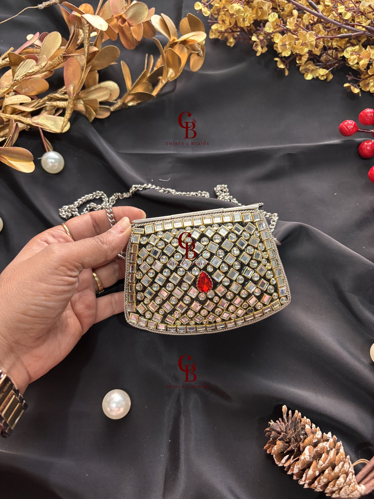 Jiya Silver Kundan Clutch - Red Crystals