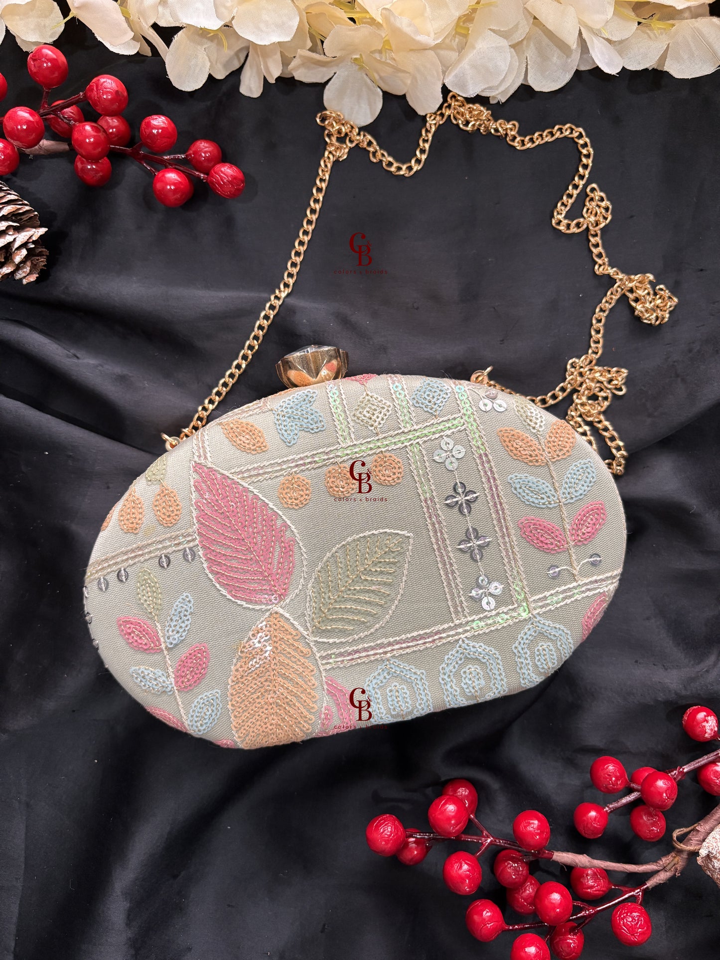 Sophie Clutch Now in bigger oval shape