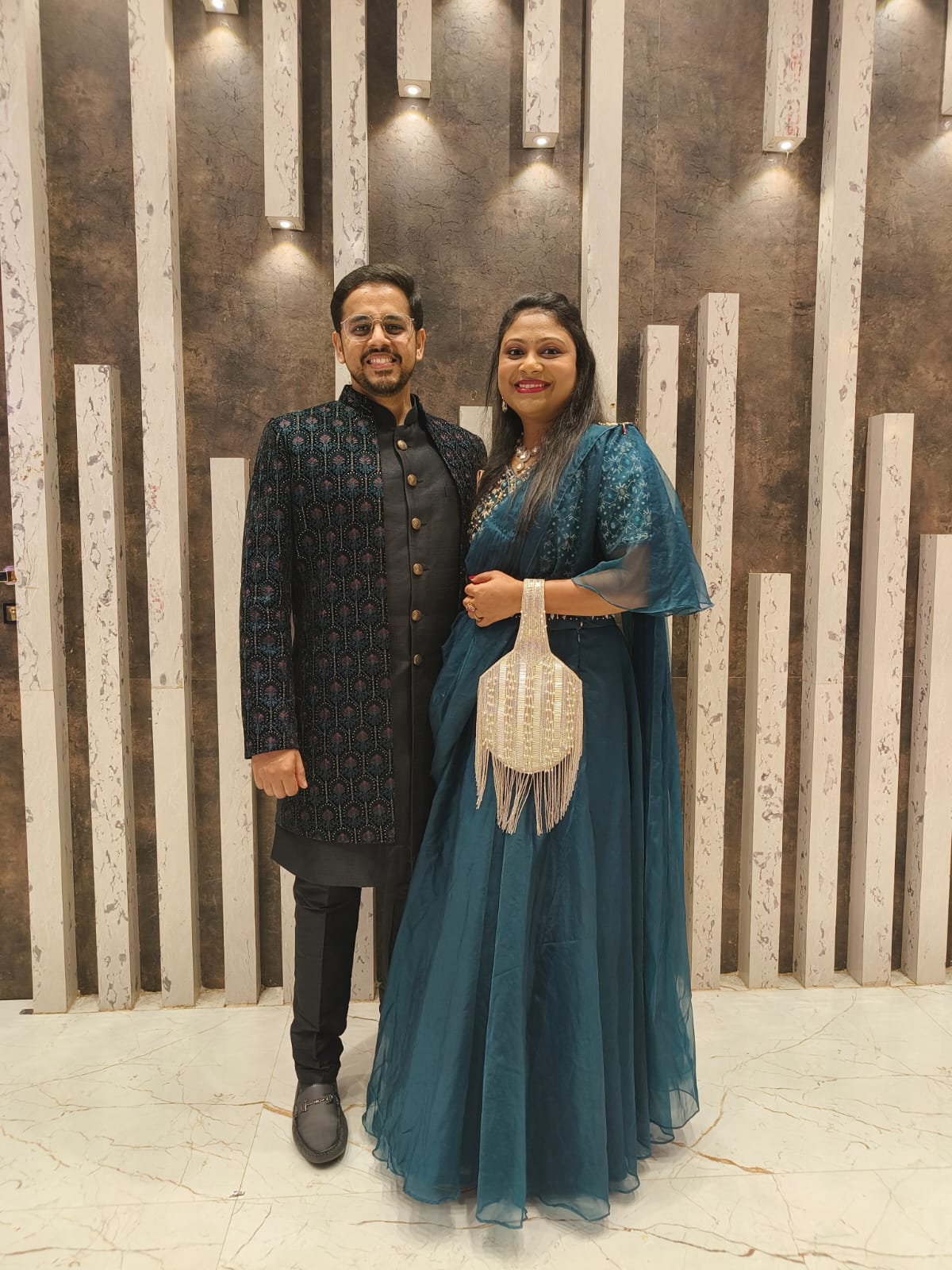 Pankhi with Mala Design Potli