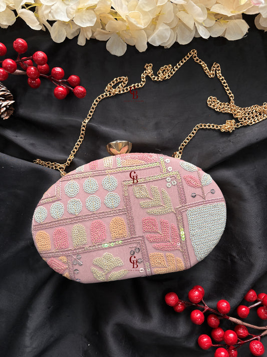 Sophie Clutch Now in bigger oval shape