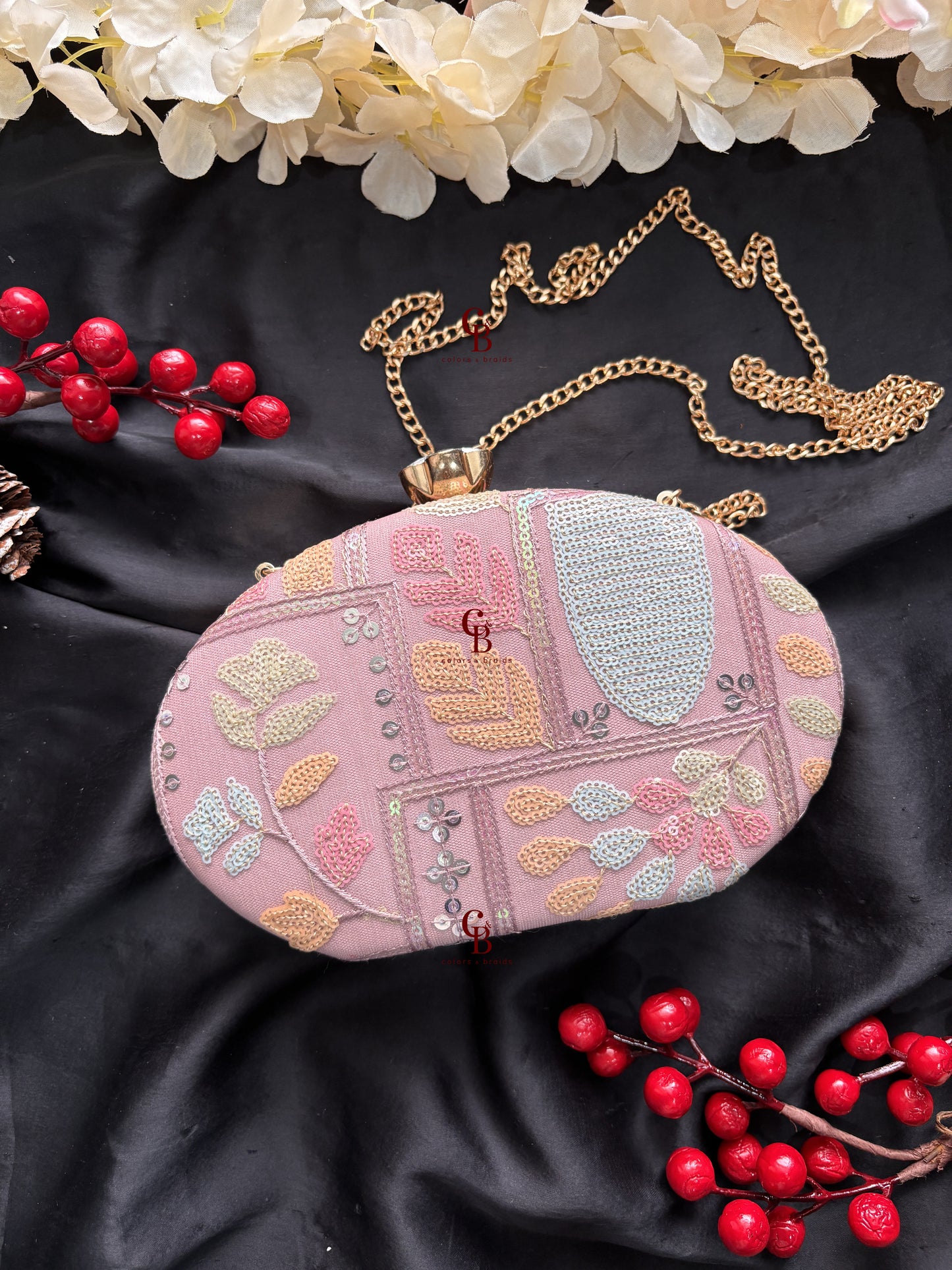 Sophie Clutch Now in bigger oval shape