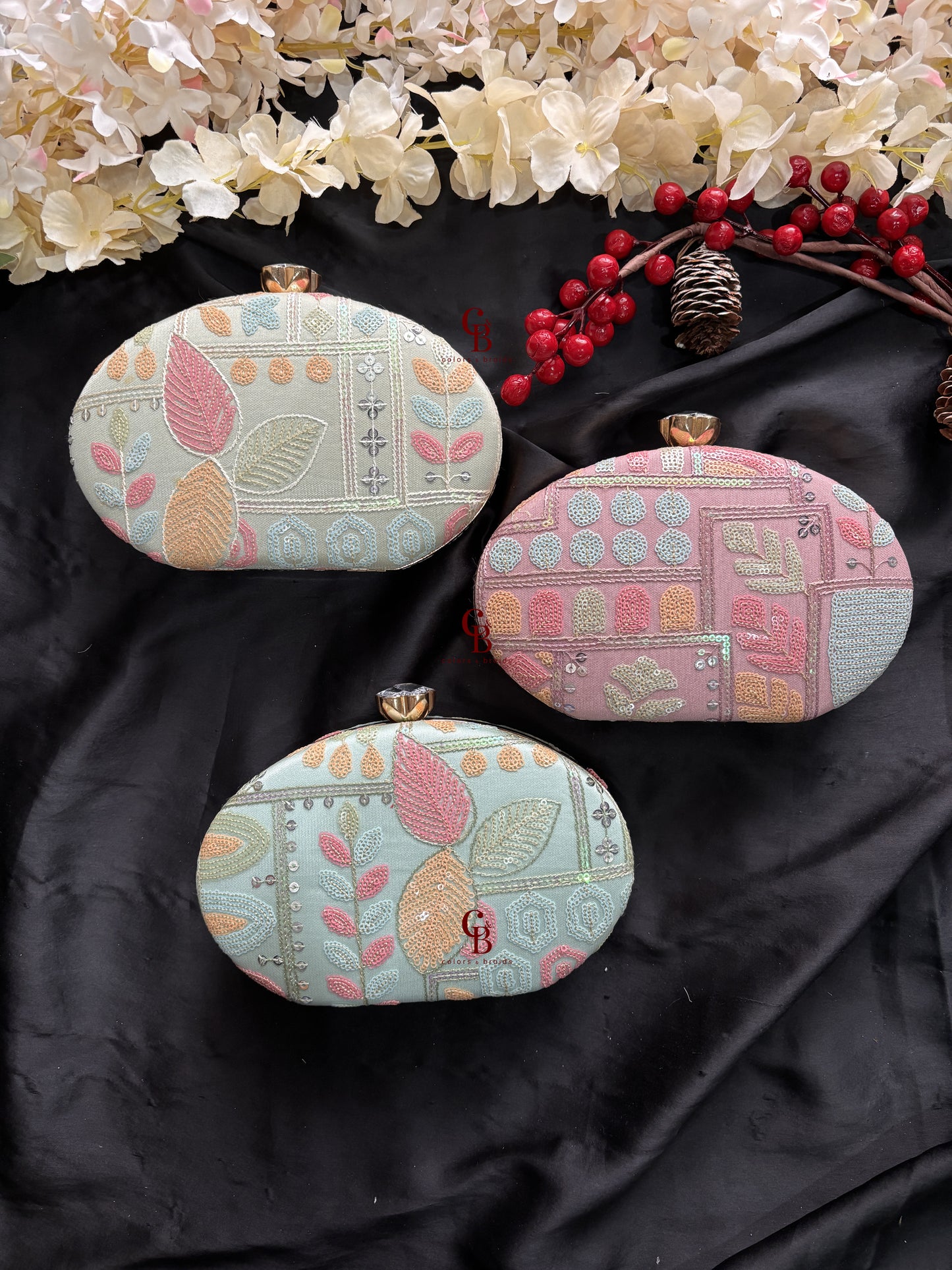 Sophie Clutch Now in bigger oval shape