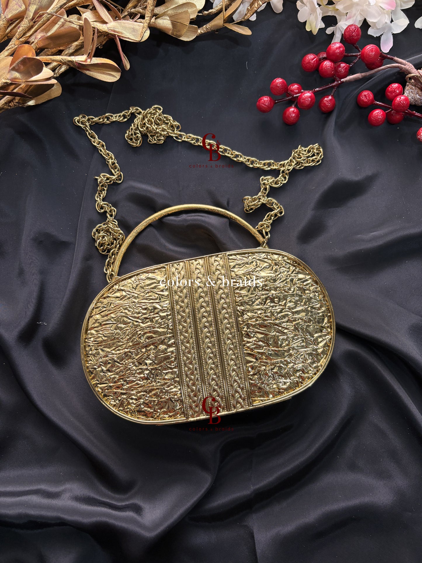 Aarvi Mother of Pearl Brass Clutch