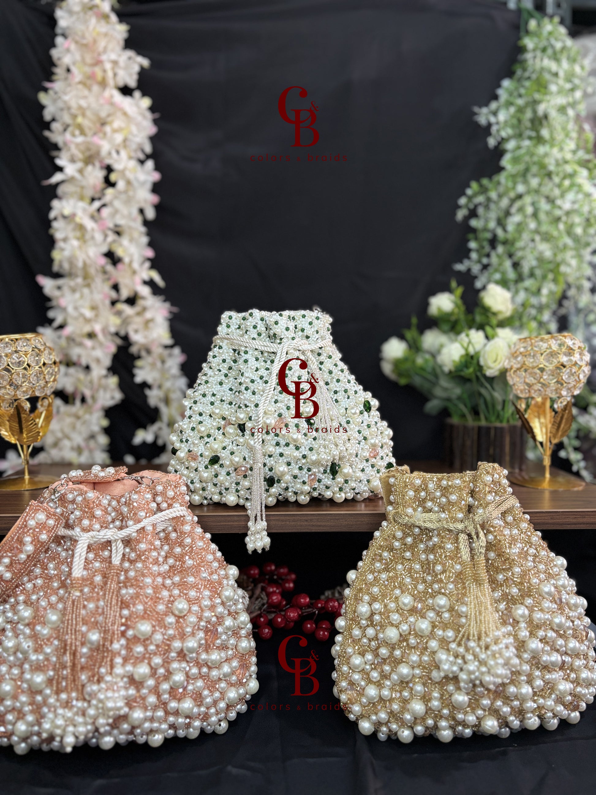 Handcrafted pearl potli bag with crystal bead detailing