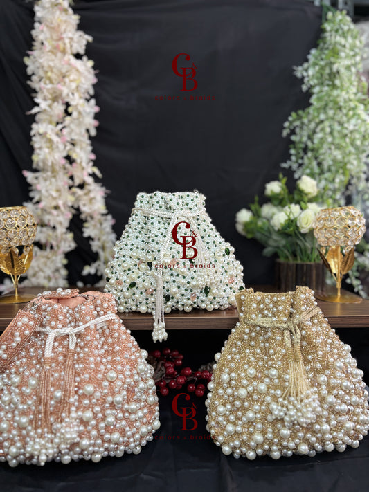 Handcrafted pearl potli bag with crystal bead detailing