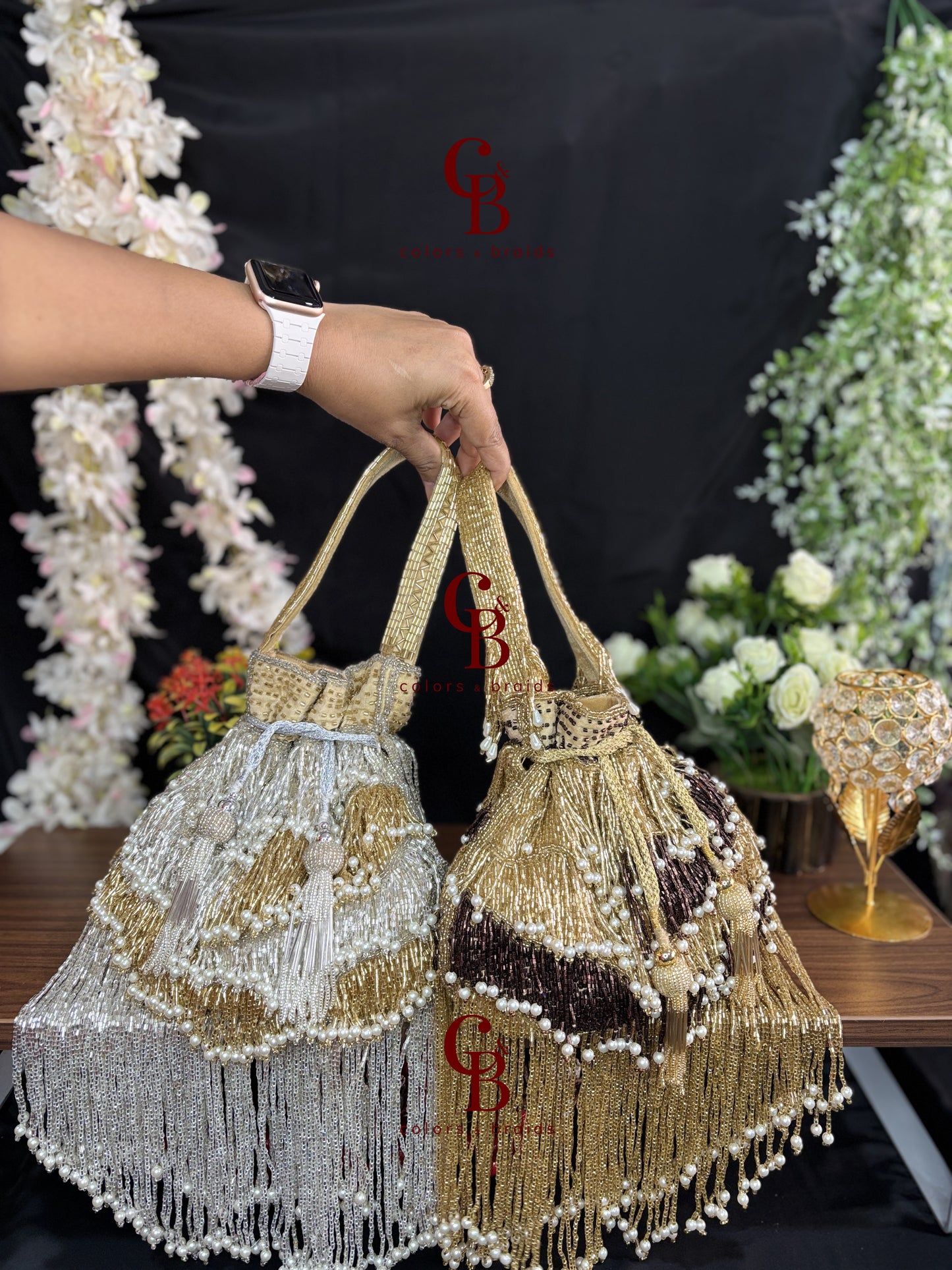 Handcrafted fringe potli bag with pearl and bead embellishments