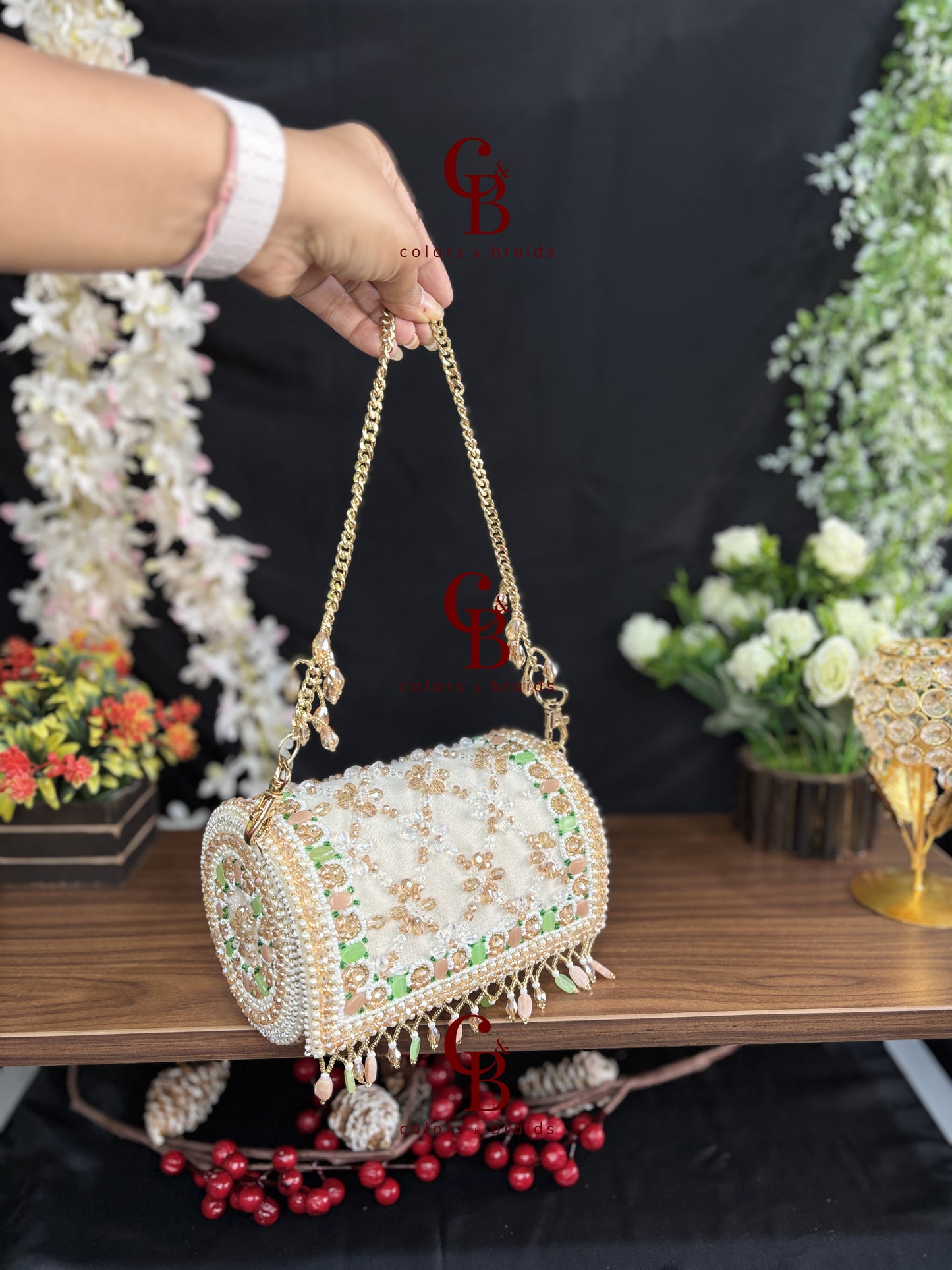 Handcrafted pearl embellished barrel clutch with pastel bead detailing and detachable gold chain