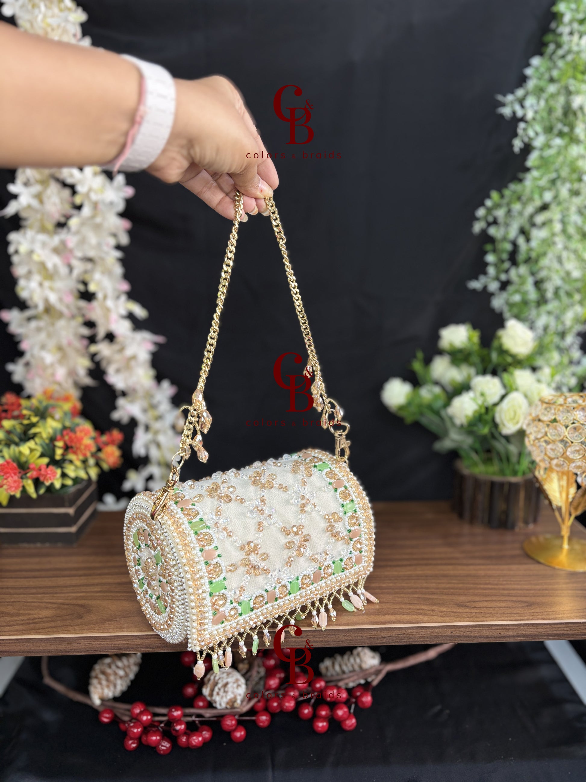 Handcrafted pearl embellished barrel clutch with pastel bead detailing and detachable gold chain