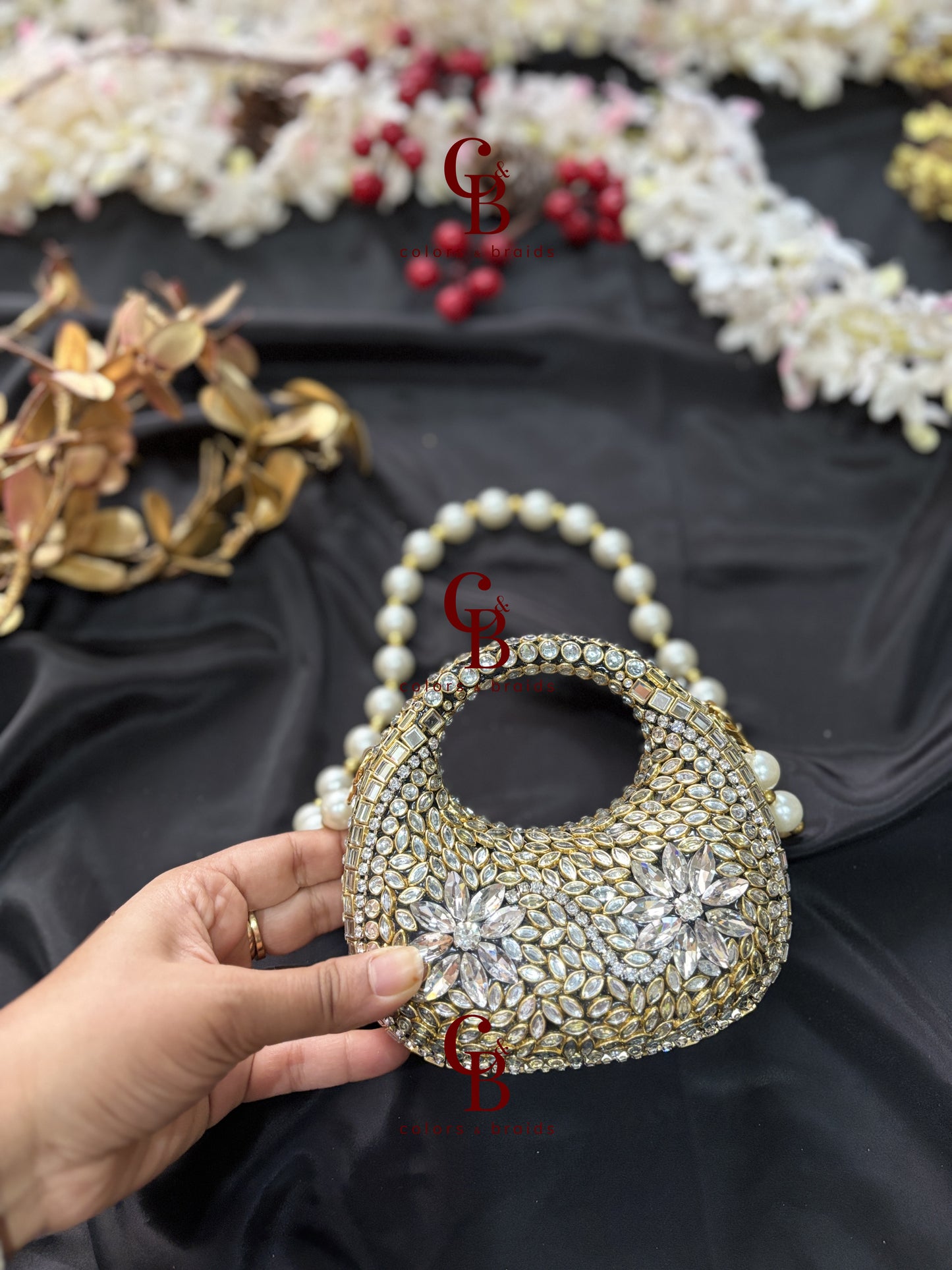 O Shaped Kundan Stone Clutch