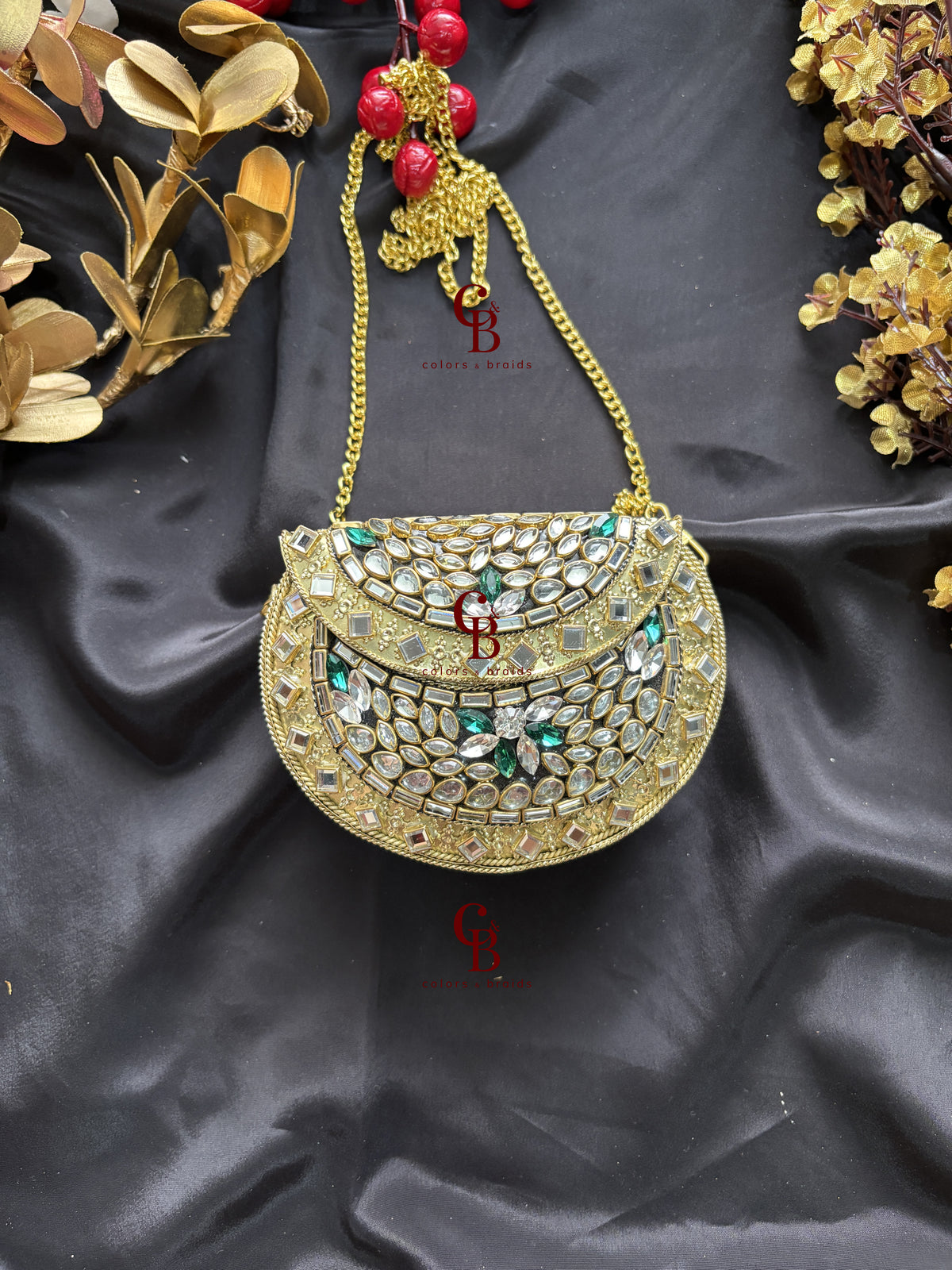 Maaera Mini Kundan Emerald Crystals Clutch