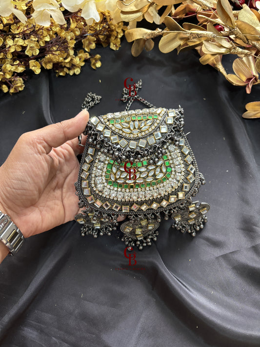 Metal Ghungroo Kundan Clutch with Grey Base
