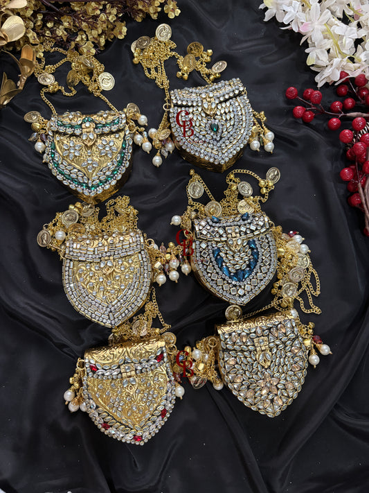 Mini Brass Kundan Stone Clutch with Charm Tassel Chain