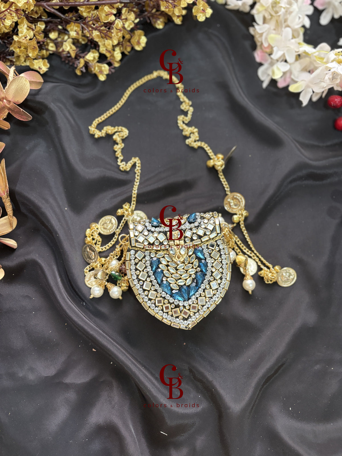 Mini Brass Kundan Stone Clutch with Charm Tassel Chain