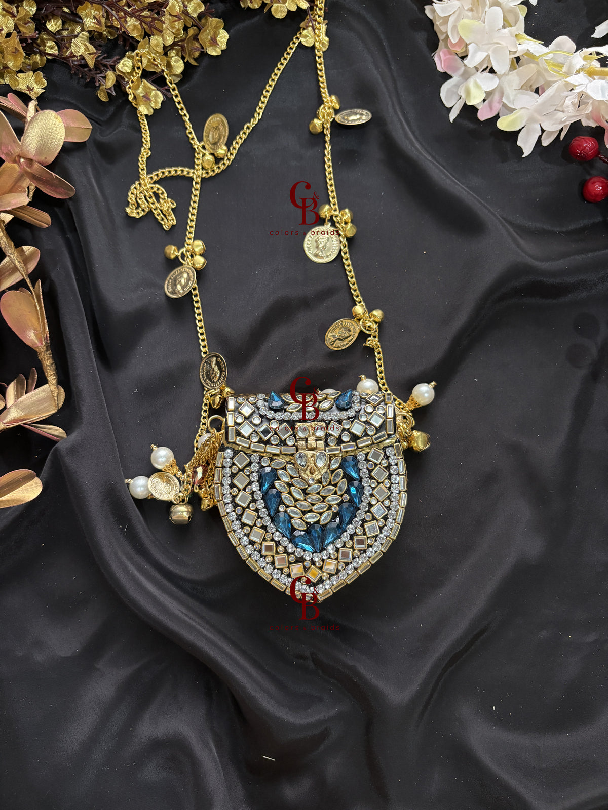 Mini Brass Kundan Stone Clutch with Charm Tassel Chain