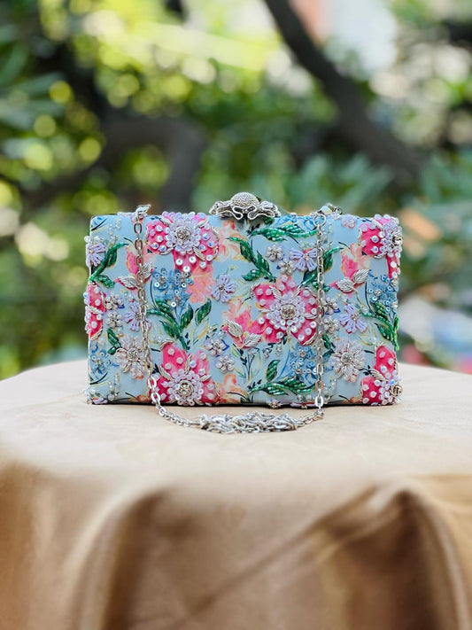 Floral clutch bag with embellishments , Print highlight Clutches