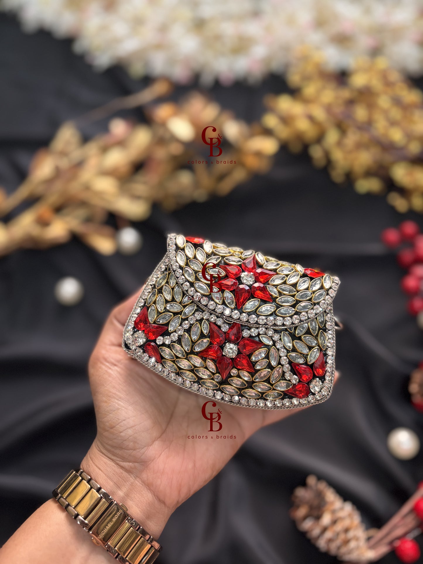 Jiya Silver Kundan Clutch - Red Crystals