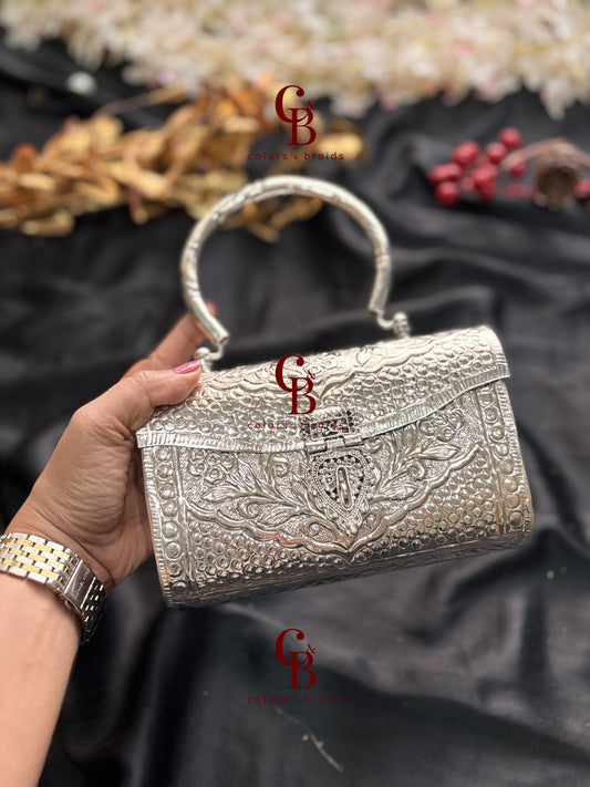 Diya Silver Brass Clutch