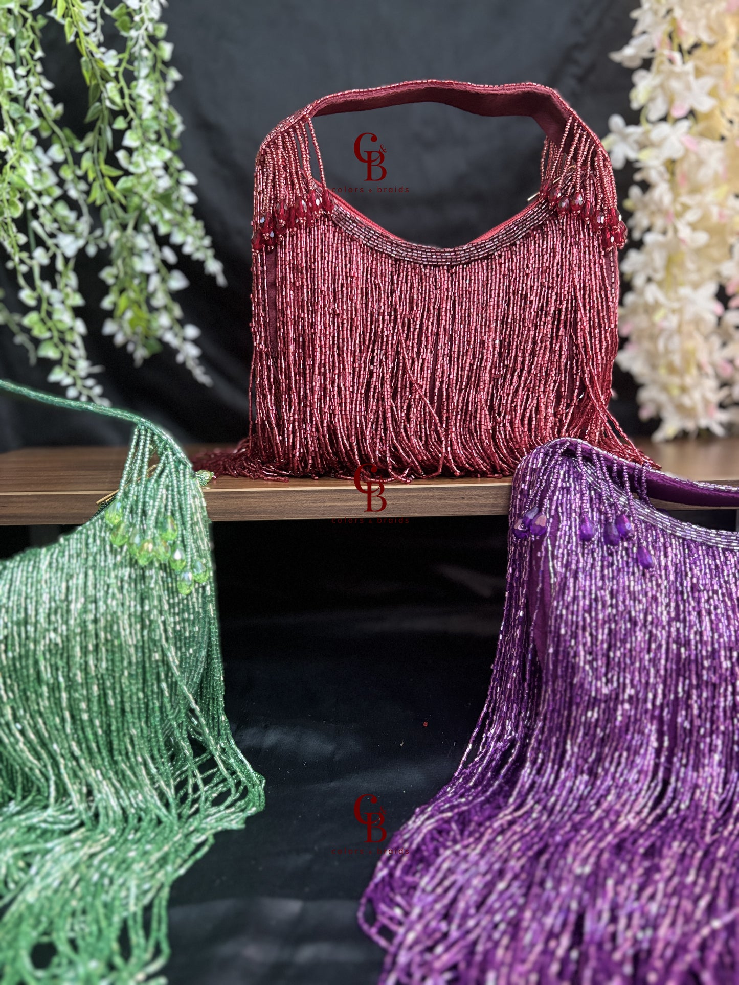 Moonlight Long Cut Dana Tassels Potli in Green, Maroon and Purple