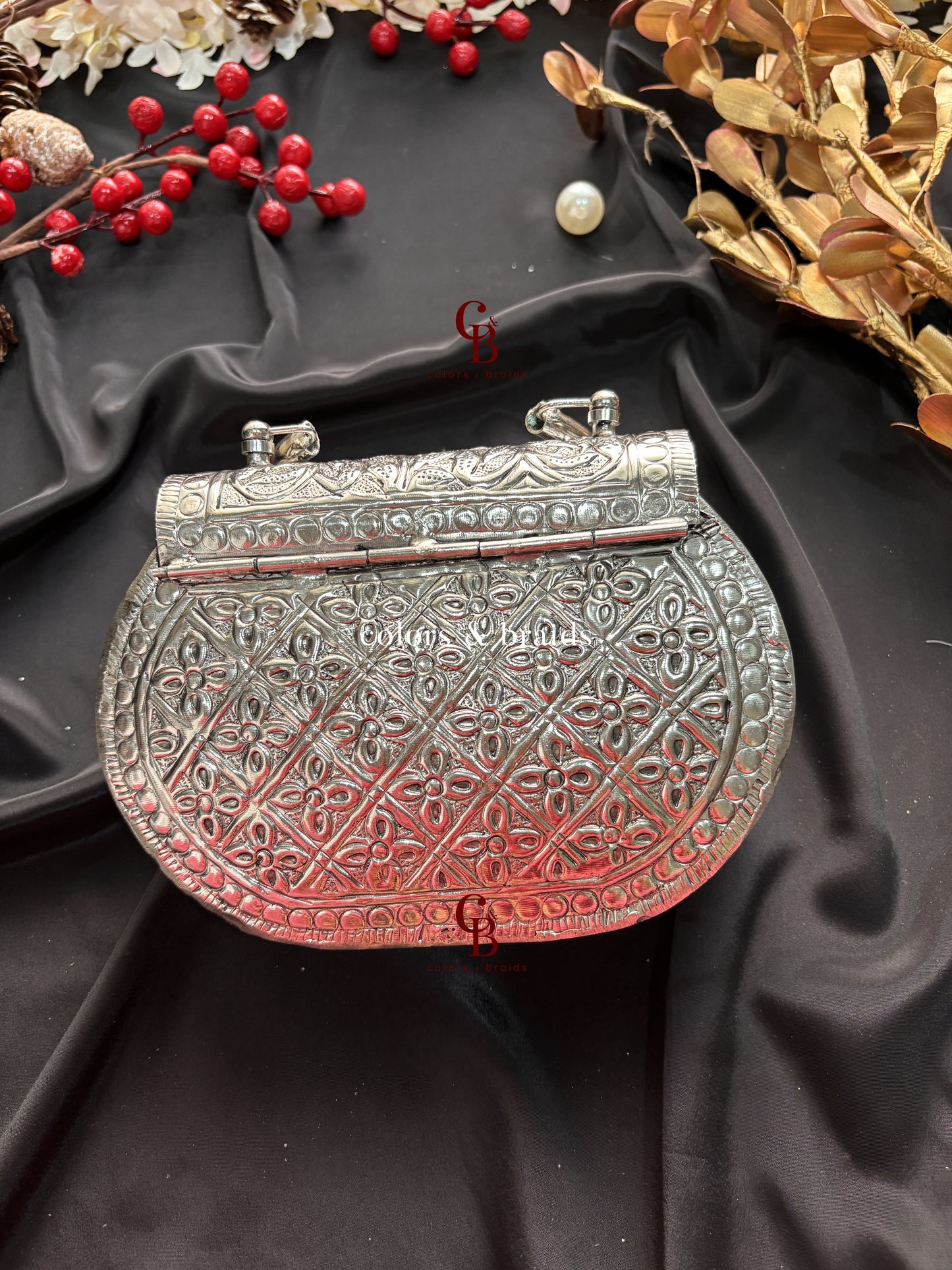 Nargis Silver Brass Clutch