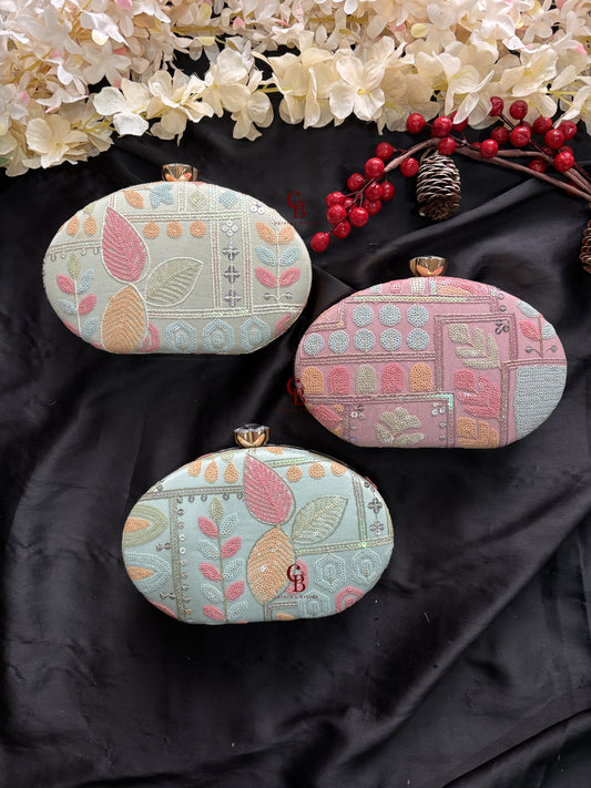 Sophie Clutch Now in bigger oval shape