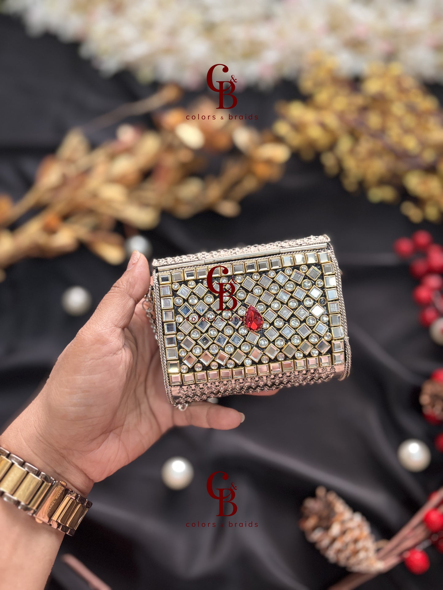 Sharvi Silver Kundan Clutch - Red Stones