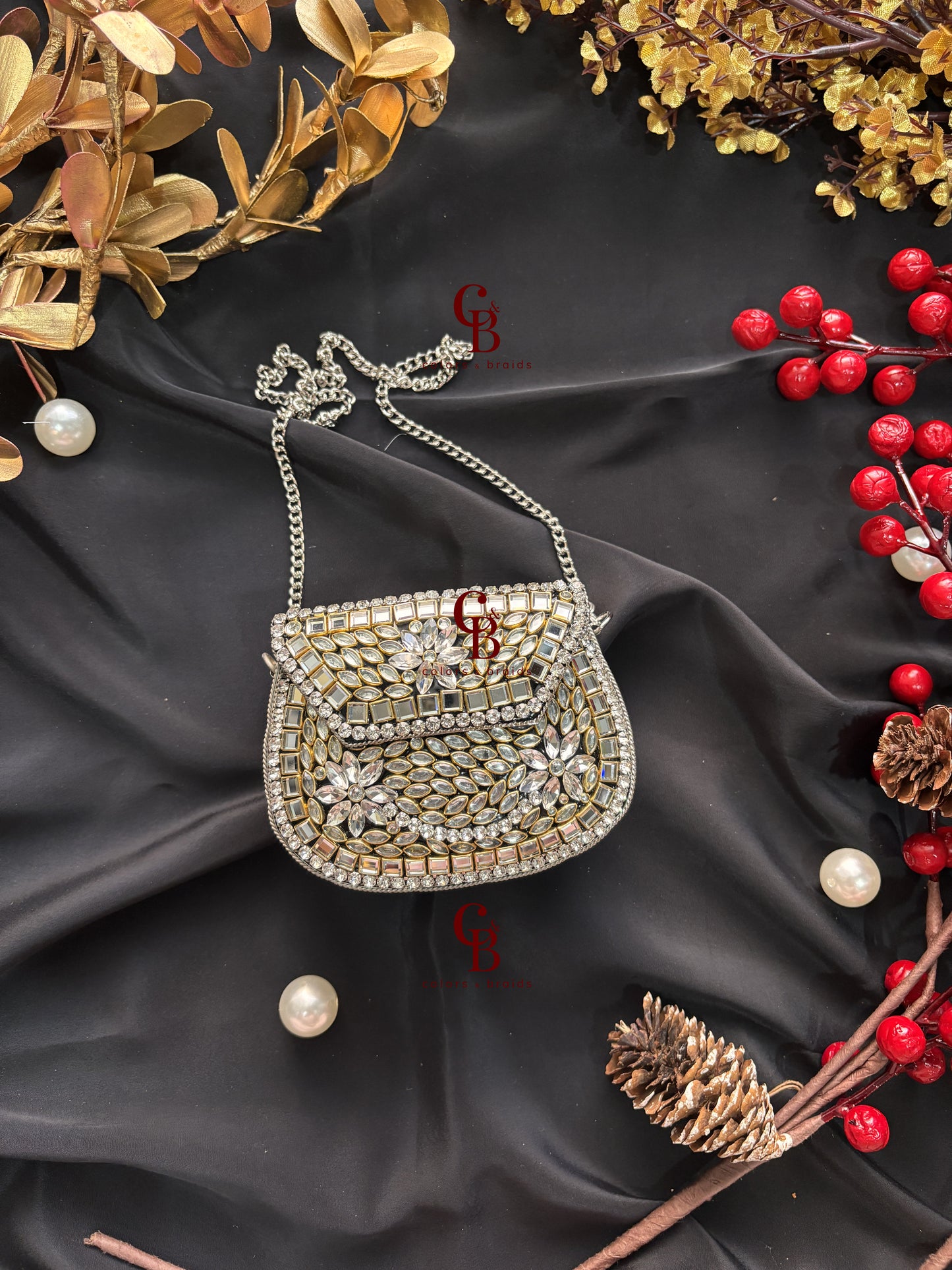 Yuvika Silver Kundan Stones Clutch