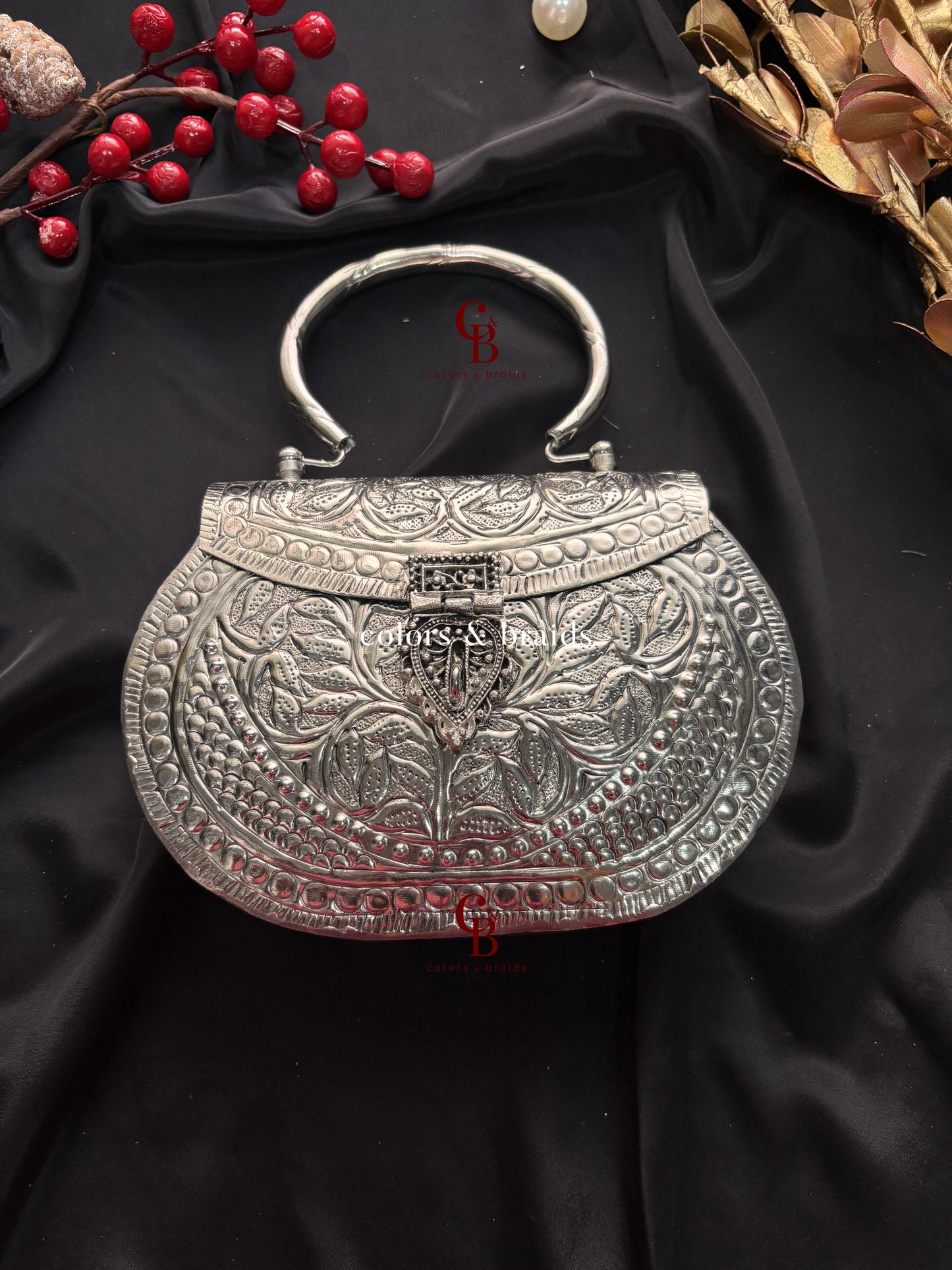 Nargis Silver Brass Clutch