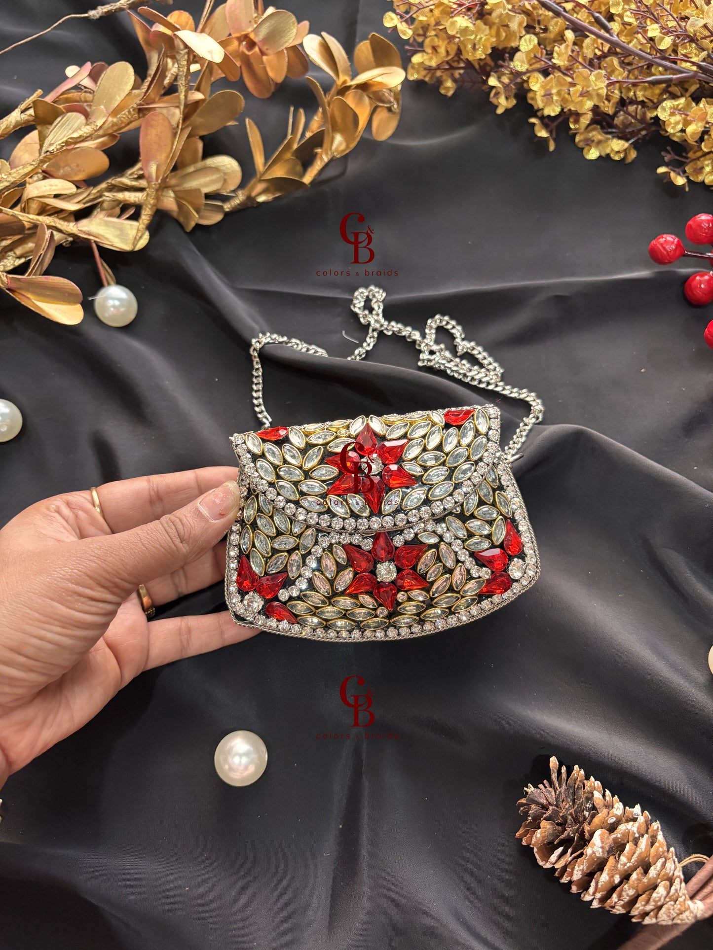 Jiya Silver Kundan Clutch - Red Crystals
