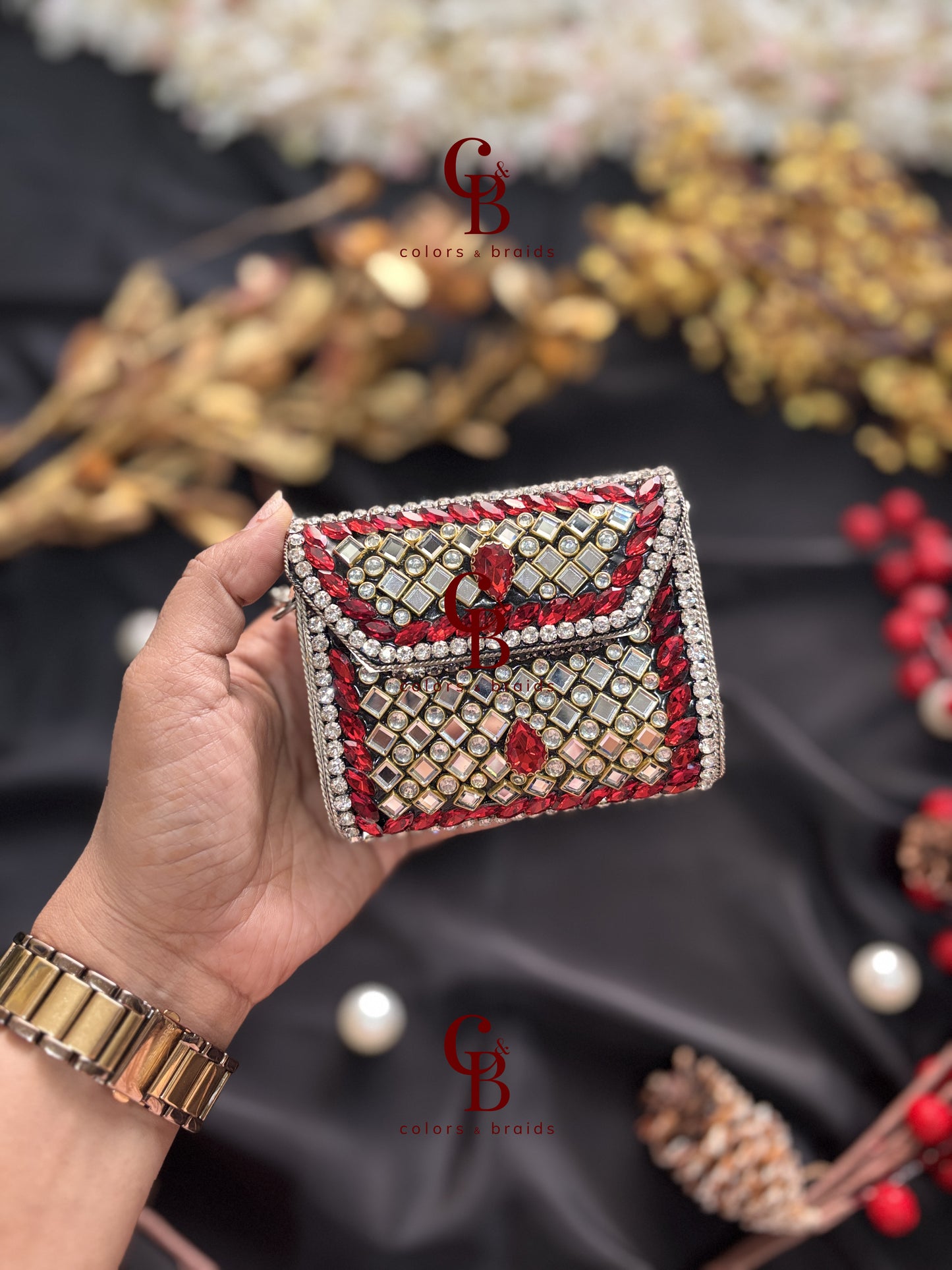 Sharvi Silver Kundan Clutch - Red Stones