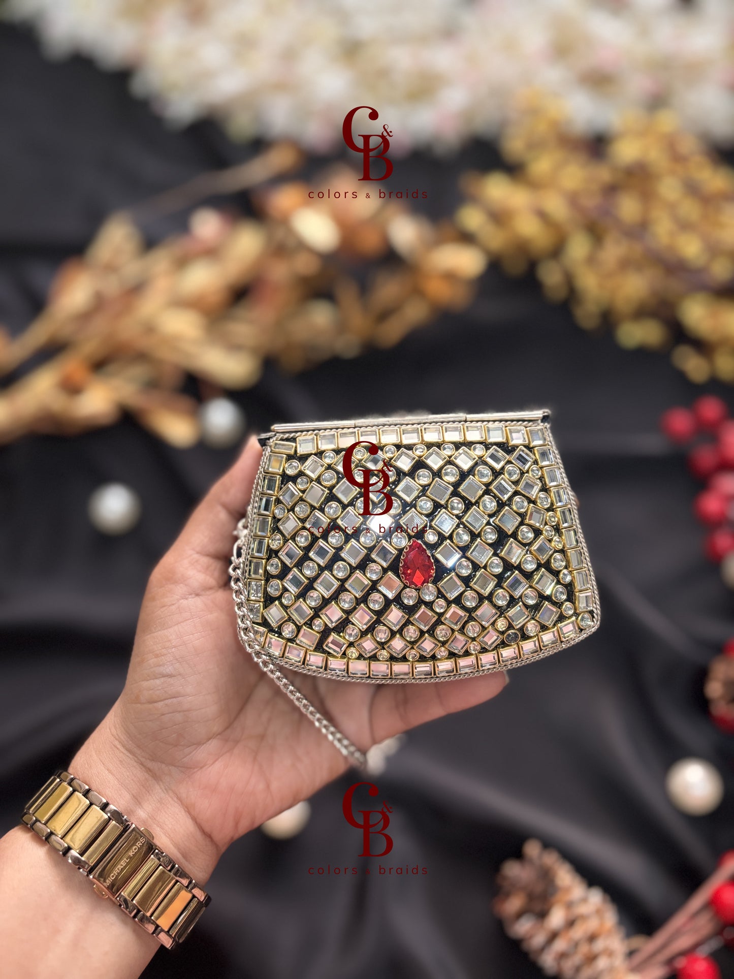 Jiya Silver Kundan Clutch - Red Crystals