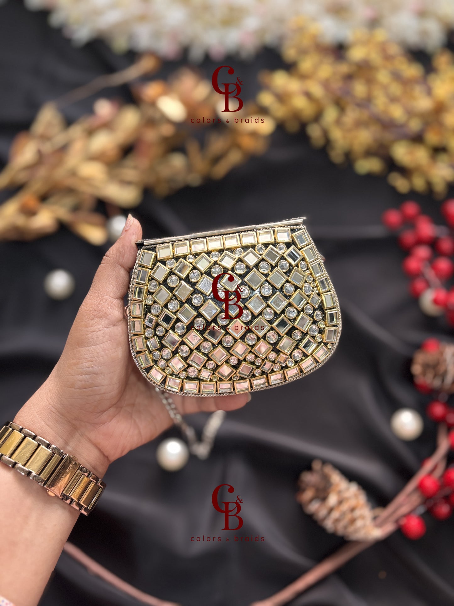 Zyra Silver Kundan Clutch with Green stones
