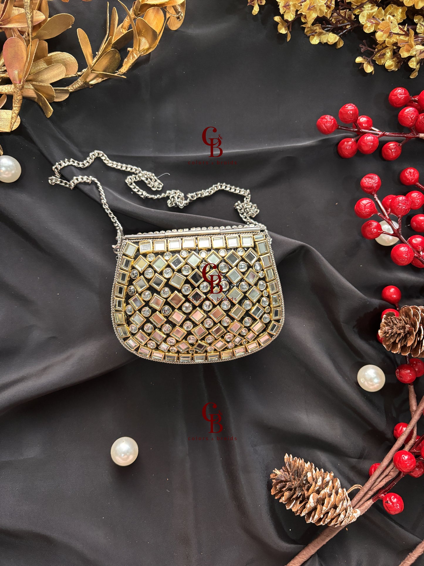Yuvika Silver Kundan Stones Clutch